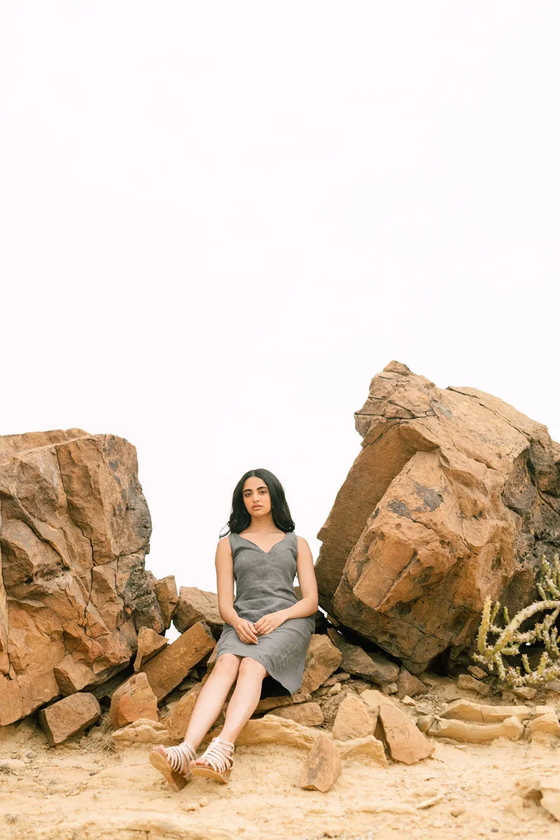 Sleeveless pleated yoke dress